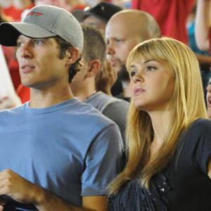 Still of Zach Gilford and Aimee Teegarden in Friday Night Lights 2006