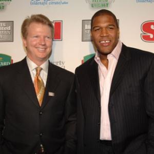 Phil Simms and Michael Strahan