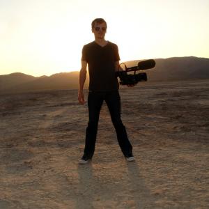 Steven Greenstreet filming for the U.S. State Department in a desert outside of Los Angeles.