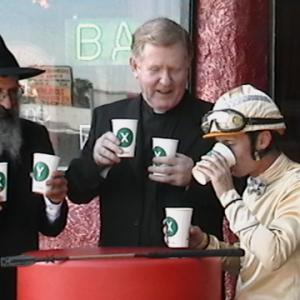 The Priest doing STARBUCKS holy water with his buddies