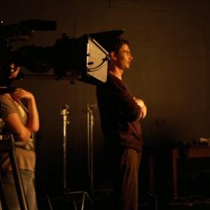 Aaron J March on set directing The Experimental Witch