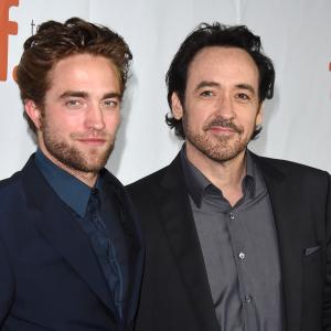 John Cusack and Robert Pattinson at event of Maps to the Stars 2014