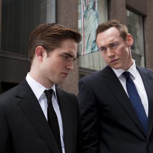 Still of Kevin Durand and Robert Pattinson in Kosmopolis (2012)