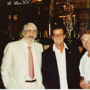 Sir Roger Moore with Gregory Peck and Dutch singer Ronnie Tober August 1992 in Hotel de Paris Monte Carlo The morning after the night before The Red Cross Ball