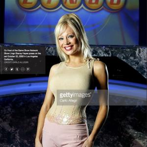 Co Host of the Game Show Network Show Lingo Stacey Hayes poses on set