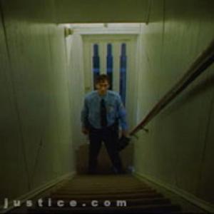 Still from In Justice Mike Tyler as Philly Cop Frank Miller