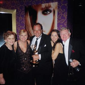 Hollywood  Helen Proimos with The Sopranos producer Martin Bruestle and his family at Emmy afterparty for HBO