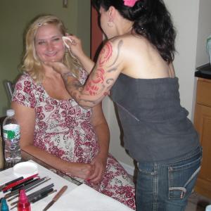 Helen Proimos (Mary) having her makeup applied on the set of 