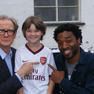 Nathaniel with Bill Nigh and chiwetel ejiofor wile filming Slapper short film