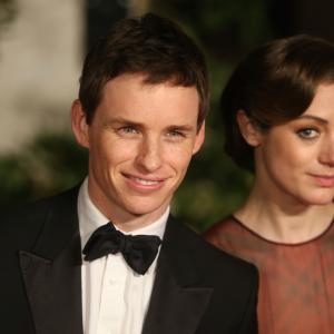 Eddie Redmayne and Hannah Bagshawe arrive for an official dinner party after the EE British Academy Film Awards at The Grosvenor House Hotel on February 16 2014 in London England