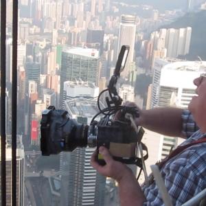 shooting flying robots from Bank of China's window cleaning bucket, 69 floors up. RED Epic, 25mm Anamorphic lens