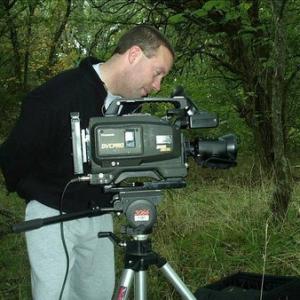 Director James McDonald sets up a shot during production on The Photograph (2003).