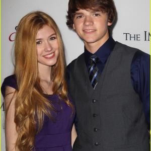 Joel Courtney and Katherine McNamara at the premiere of The Impossible