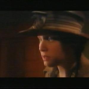 Still of Gwenfair Vaughan as series regular Hanah Jones in the first season of Y Palmant AurThe Golden Pavement period drama series