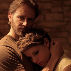Still of Gabe (Bill Heck) and Shannon (Amy Seimetz) from Pit Stop