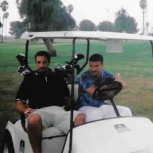 Enjoying his favorite pastime Carlo with friend Dennis relax on a southern California course
