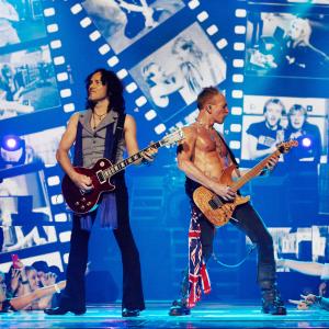 Still of Phil Collins Vivian Campbell and Phil Collen in Def Leppard Viva! Hysteria Concert 2013