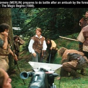 Jason Connery MERLIN prepares for a scene with Clanranald stunt coordinator Chick Allen BLAZES DEPUTY