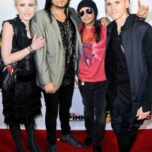 LOS ANGELES CA  July 02 Rockers Moira Ross Alex Frejrud Neil DMonte and GhostCircus Apparels eli james arrive for the PreComicCon Party hosted by Infolistcom held at the Sofitel HotelBeverly Hills
