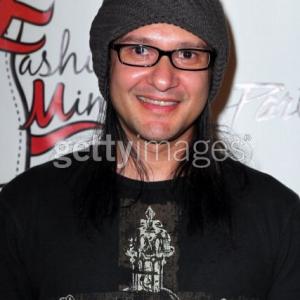 Rock drummer/actor/artist Neil D'Monte arrives on the red carpet for LA Fashion Minga @ Boulevard 3/Hollywood, CA. Oct 21, 2011/LAFW.