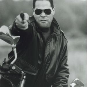 Rudy C. Jones w/gun on a motorcycle headshot(8x10)for NY Undercover FOX TV