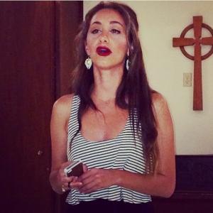 STG actress Kristina Karim singing at Santa Monicas First Presbyterian Church to the Mariners a senior group