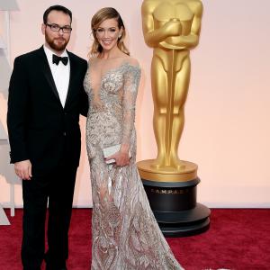 Dana Brunetti and Katie Cassidy at event of The Oscars 2015