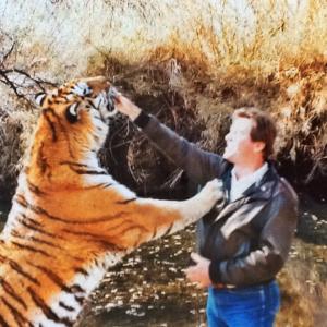 Randy hand feeding Noel Marshal and Tippy Hedrins tiger