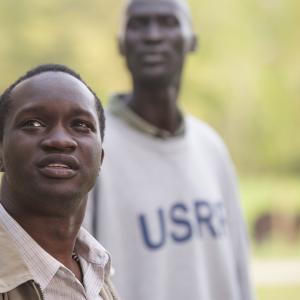 Still of Arnold Oceng and Ger Duany in The Good Lie 2014