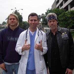 Charlie Hunman David Aranovich and Ron Perlman on the set of Sons of Anarchy