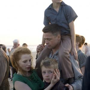 Still of Brad Pitt Jessica Chastain Tye Sheridan and Laramie Eppler in The Tree of Life 2011