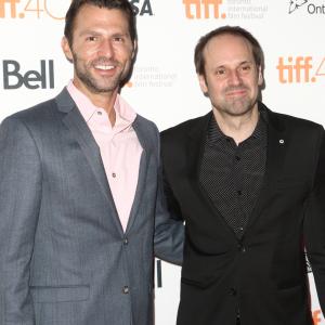 Jeff Skoll and Jonathan King at event of Beasts of No Nation (2015)