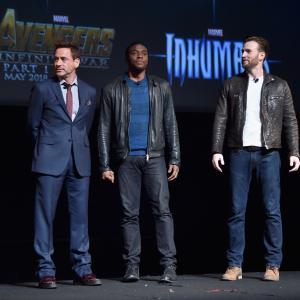 Robert Downey Jr., Chris Evans and Chadwick Boseman at event of Black Panther (2018)