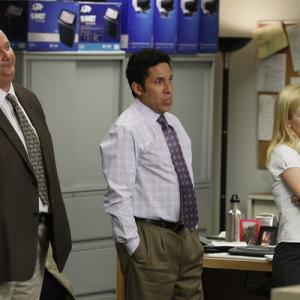 Still of Oscar Nuñez, Angela Kinsey and Brian Baumgartner in The Office (2005)