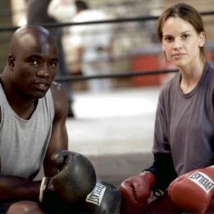 Mike Colter and Hilary Swank