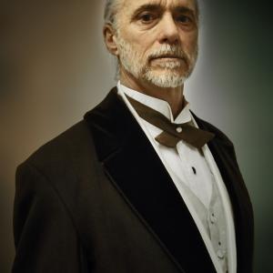 Carson Grant as Father of the Nation in the film Raising Flames 2014
