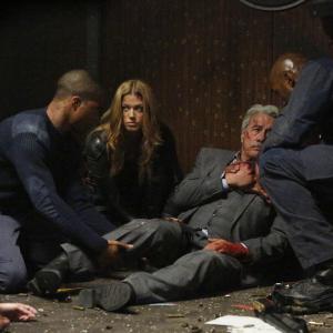 Still of Edward James Olmos Henry Simmons Adrianne Palicki and Cornelius Smith Jr in Agents of SHIELD 2013