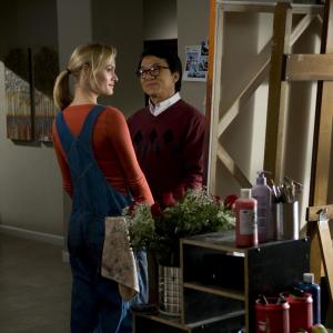 Still of Jackie Chan and Amber Valletta in Kaimynas snipas (2010)