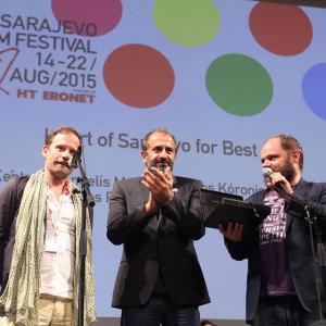 The actors from right to left Yorgos Pirpassopoulos Panos Koronis and Makis Papadimitriou accept the award Heart of Sarajevo for best cast along with Vagelis Mourikis Yorgos Kedros and Sakis Rouvas