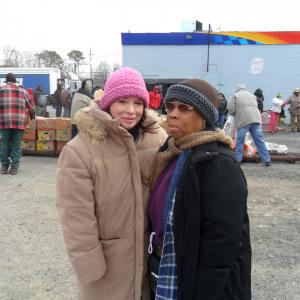 Pastor Sue And Maria Baan giving out food and clothing in Bellport,N.Y.