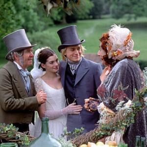 l to r unknown Anne Hathaway Charlie Hunnam and Barry Humphries as Mrs Crummles