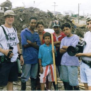 Gaffer Sean Finnegan and Director/Cameraman Steven Scaffidi with Honduran locals while filming 