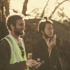 Director Aaron McCann L and Star Toshi Okuzaki R on the set of Top Knot Detective