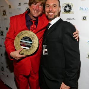 Aaron Merken with Eric Casaccio accepting the Best Actor in a Short Award at the Action On Film International Film Festival representing 