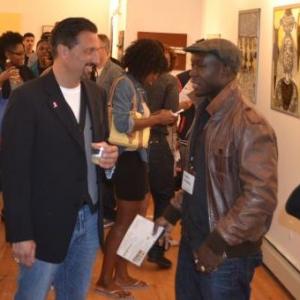Adam Dispirito with artist Andre Woolery at Art in Flux Harlem NY