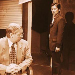 LR Chris Kyme and Duc Luu in a still from the Hong Kong stage Premiere of Glengarry Glen Ross