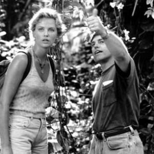 CHARLIZE THERON and Director RON UNDERWOOD on the set of MIGHTY JOE YOUNG