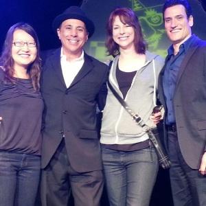 Tommy T onstage with Michael Vitiello from the Guidos of Comedy, Diane Neal from Law & Order SVU, and comedian Helen Hong.