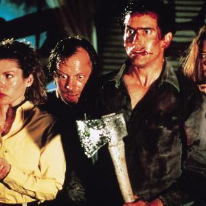 Still of Sarah Berry Bruce Campbell Kassie Wesley DePaiva and Dan Hicks in Evil Dead II 1987