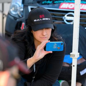 Taking a photo for social media while the Team prepares cars for the race. Skullcandy Team Nissan at Circuit of The Americas, Austin, TX.